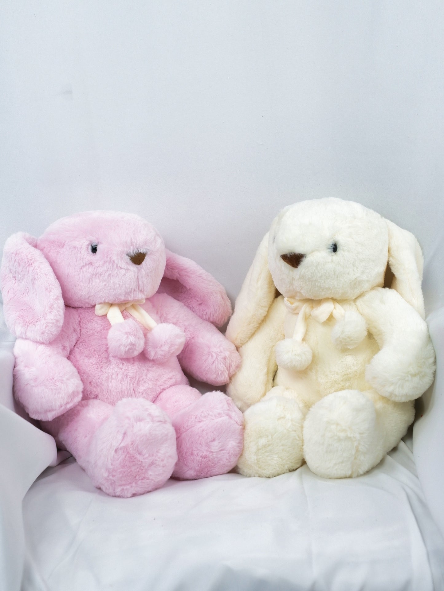 Cream and pink plush bunny sitting together - Farm-Sook Flowers & Coffee