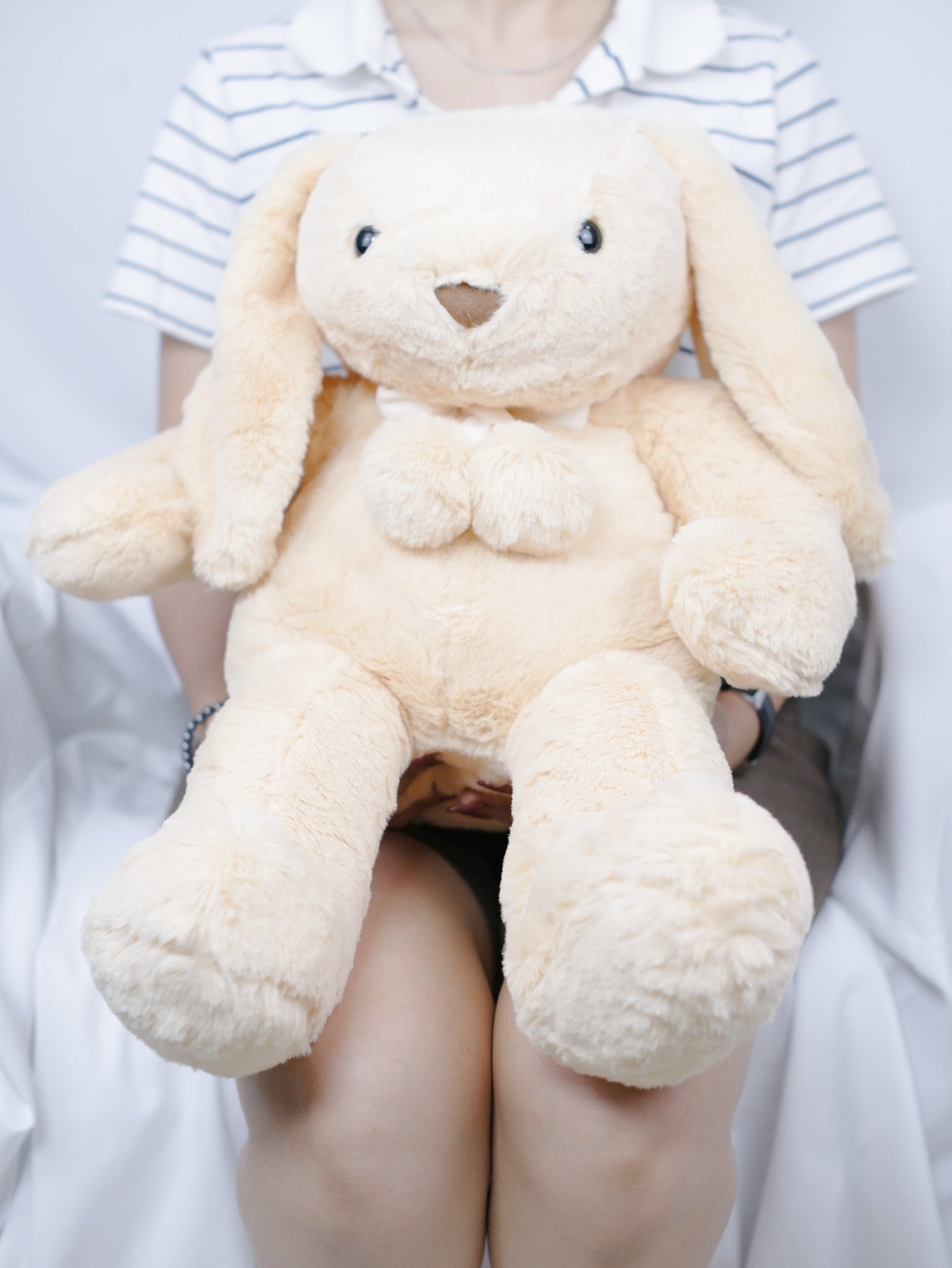 Latte Bunny sitting on lap - Farm-Sook Flowers & Coffee